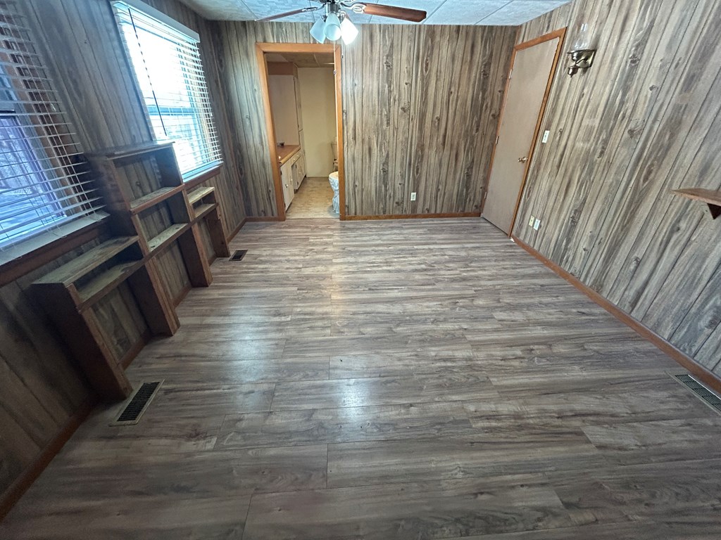 939 Watson Road Titusville, PA 16354 - Photo 20 of 39 a view of a hallway with wooden floor and staircase