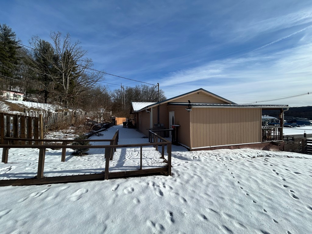 939 Watson Road Titusville, PA 16354 - Photo 36 of 39 a backyard of a house with table and chairs