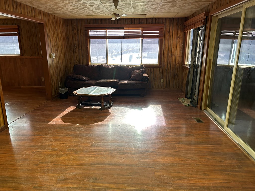 939 Watson Road Titusville, PA 16354 - Photo 6 of 39 a living room with furniture and a window