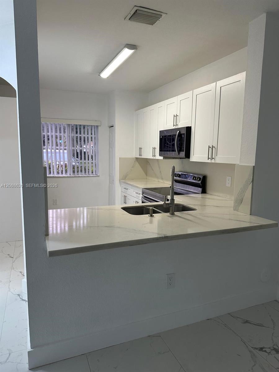 5937 Riverside Avenue Tamarac, FL 33321 - Photo 13 of 23 Gallery Image 13