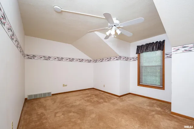 a view of a room with a fan