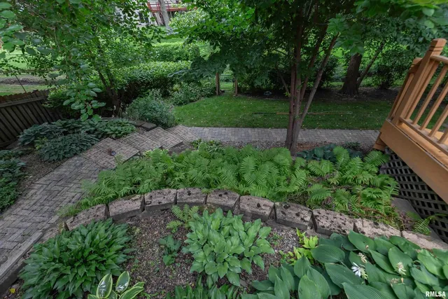 a view of backyard with green space
