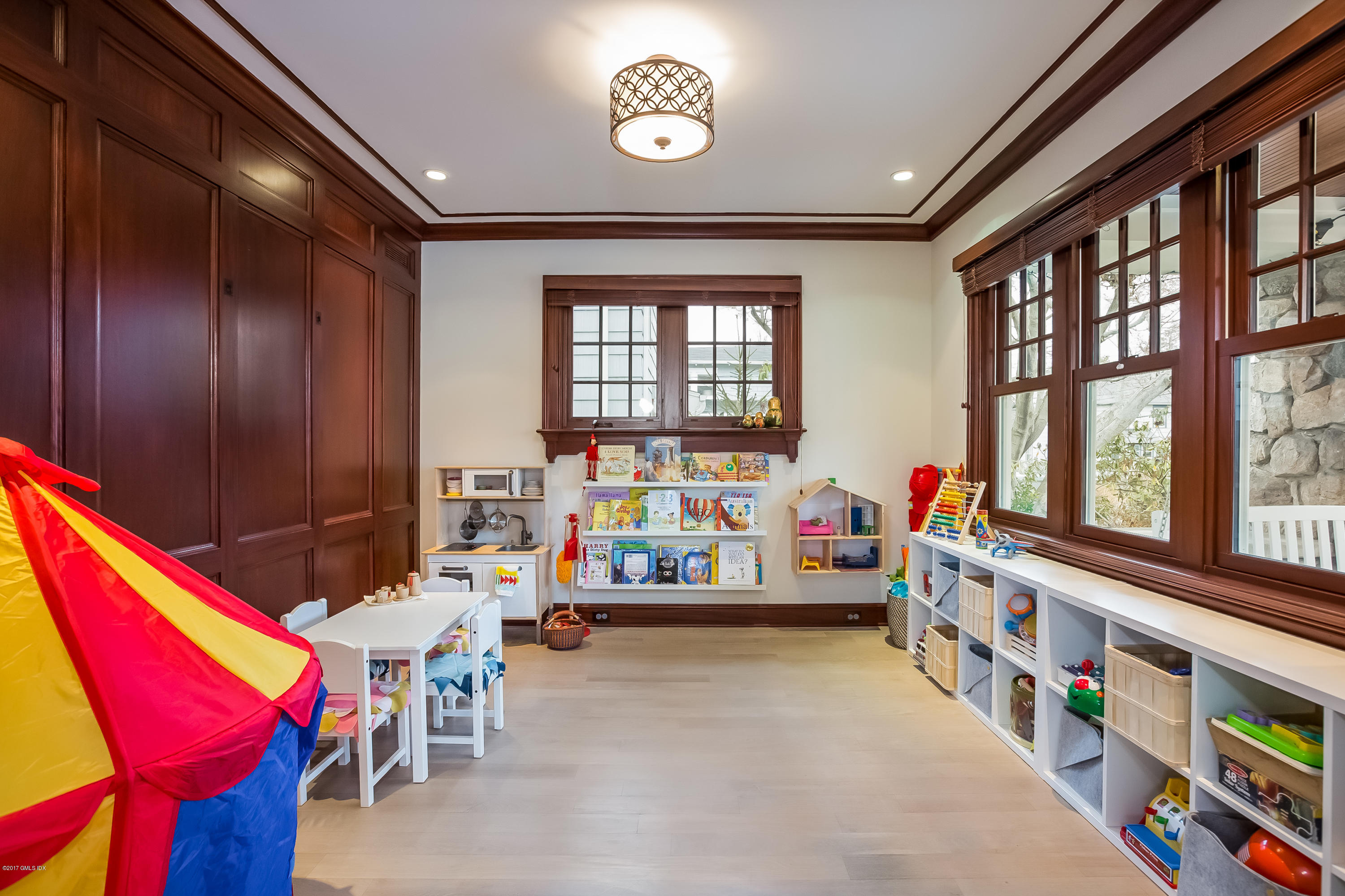 39 Edgewater Drive Old Greenwich, CT 06870 - Photo 13 of 19 a sitting area with furniture and a window