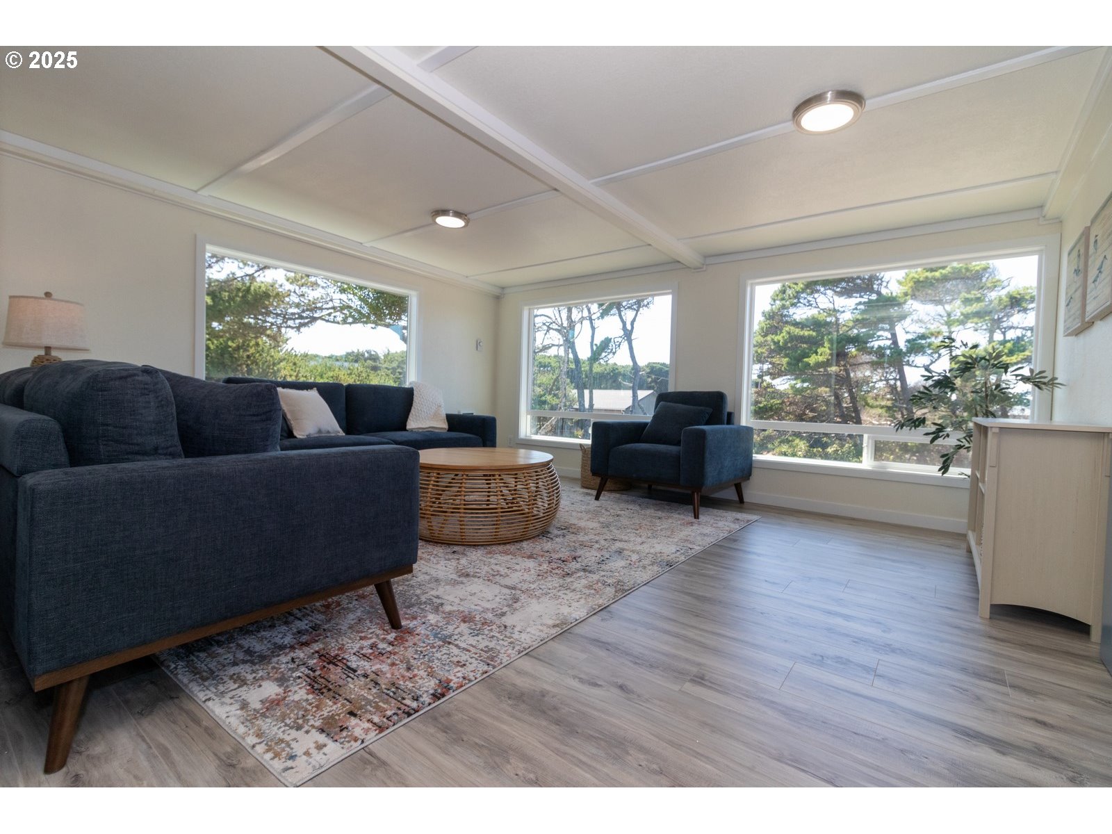 4589 Meares Street Florence, OR 97439 - Photo 12 of 35 a living room with furniture and a large window