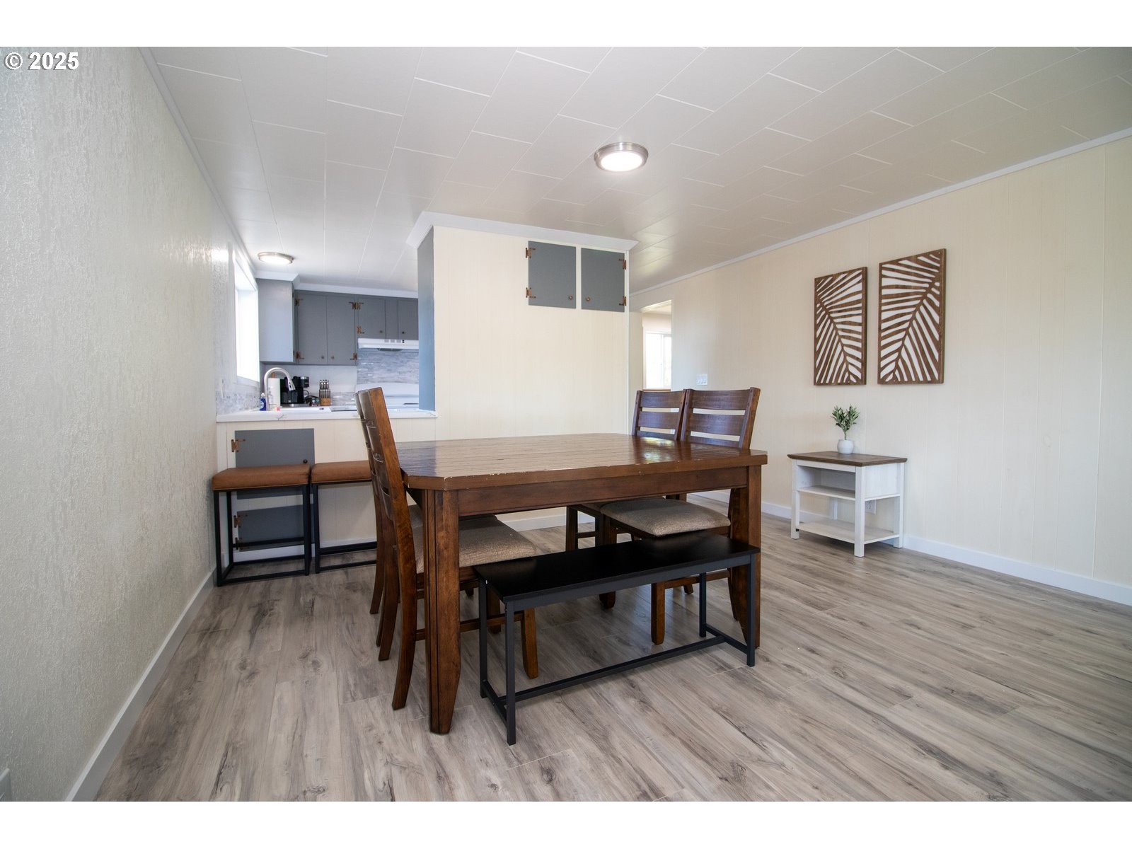 4589 Meares Street Florence, OR 97439 - Photo 18 of 35 a dining room with furniture and wooden floor