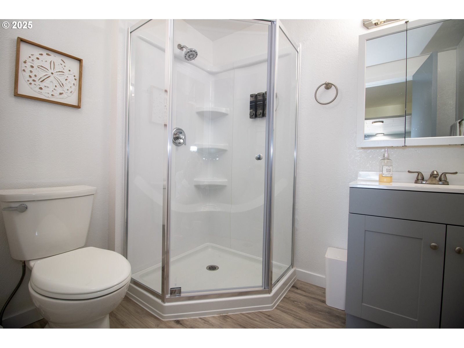 4589 Meares Street Florence, OR 97439 - Photo 22 of 35 a bathroom with a toilet and a shower