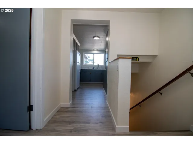a bathroom with a toilet sink and shower