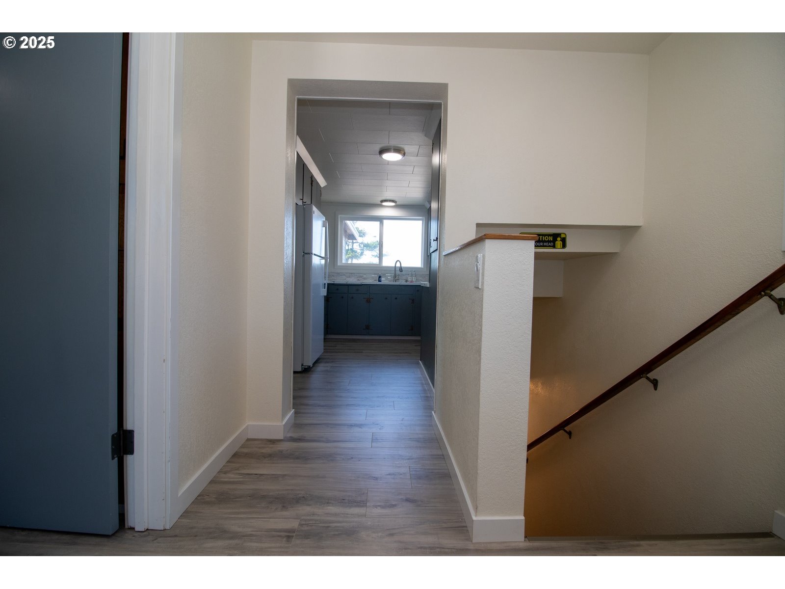 4589 Meares Street Florence, OR 97439 - Photo 25 of 35 a view of hallway with wooden floor