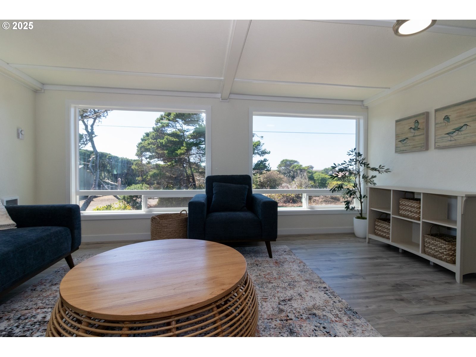 4589 Meares Street Florence, OR 97439 - Photo 7 of 35 a living room with furniture and a large window