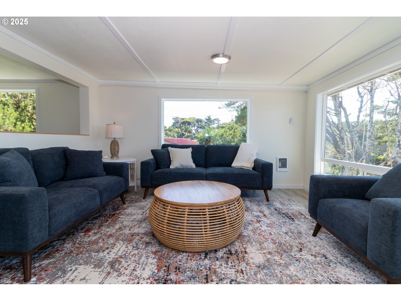 4589 Meares Street Florence, OR 97439 - Photo 10 of 35 a living room with furniture a window and a couch