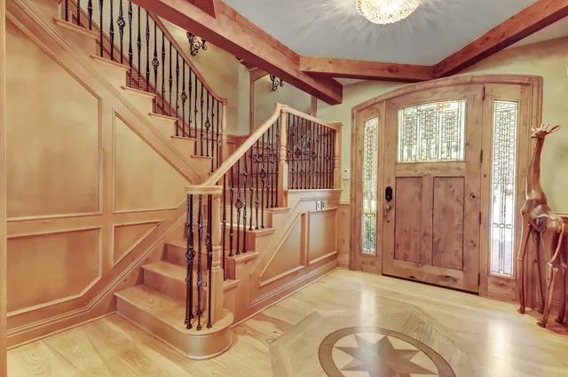 a view of a dining room with furniture window and outside view