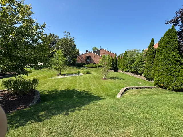 a view of a golf course with a garden