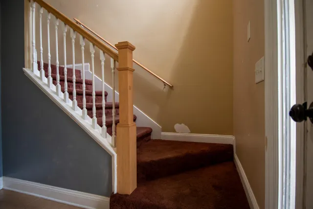a view of entryway with a front door