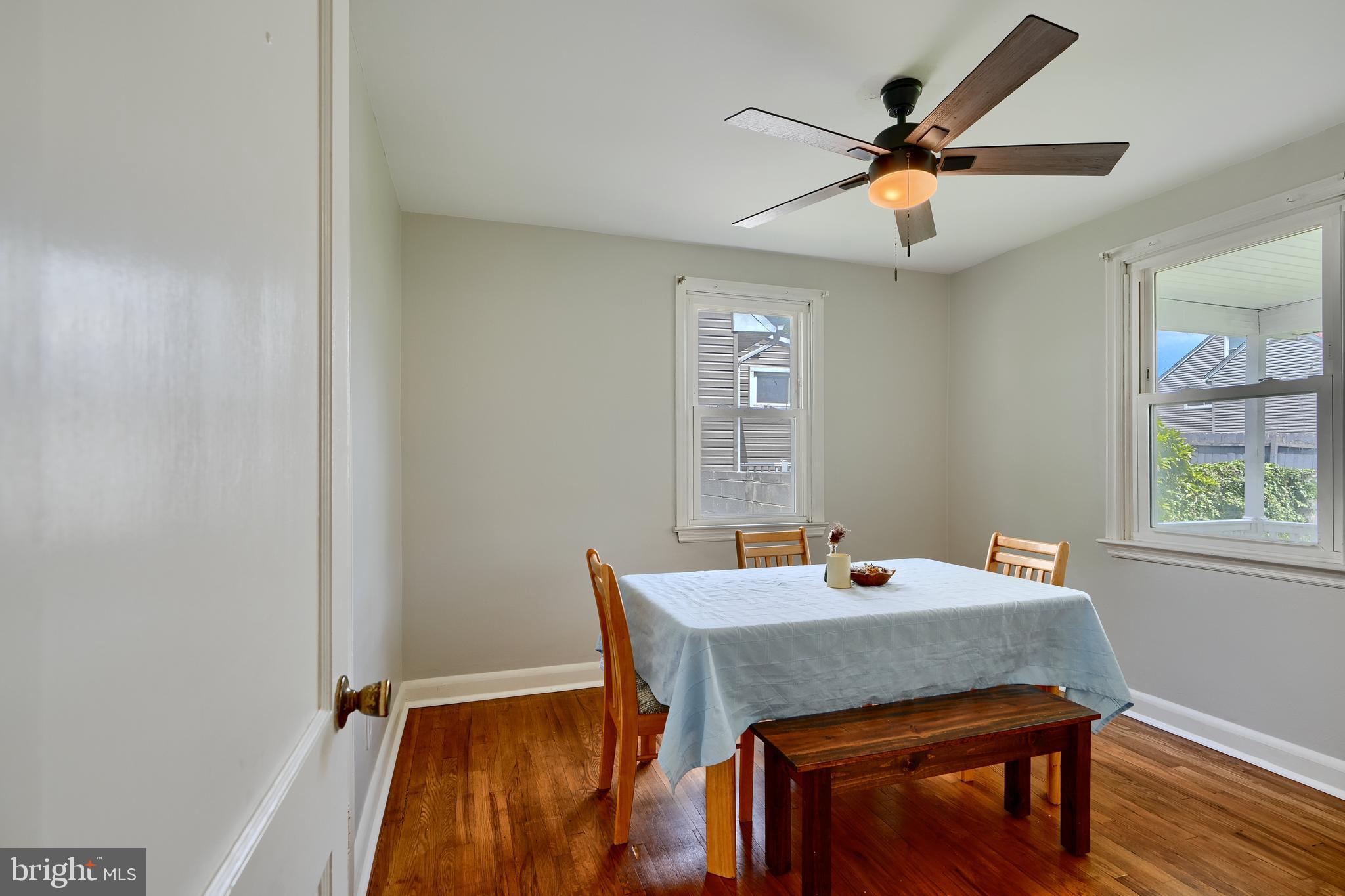 8203 Oakleigh Road Baltimore, MD 21234 - Photo 21 of 56 a view of a workspace with furniture and a window