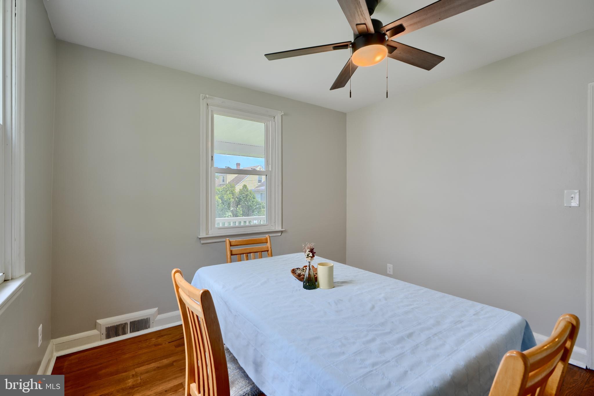 8203 Oakleigh Road Baltimore, MD 21234 - Photo 23 of 56 a view of a dining room with furniture