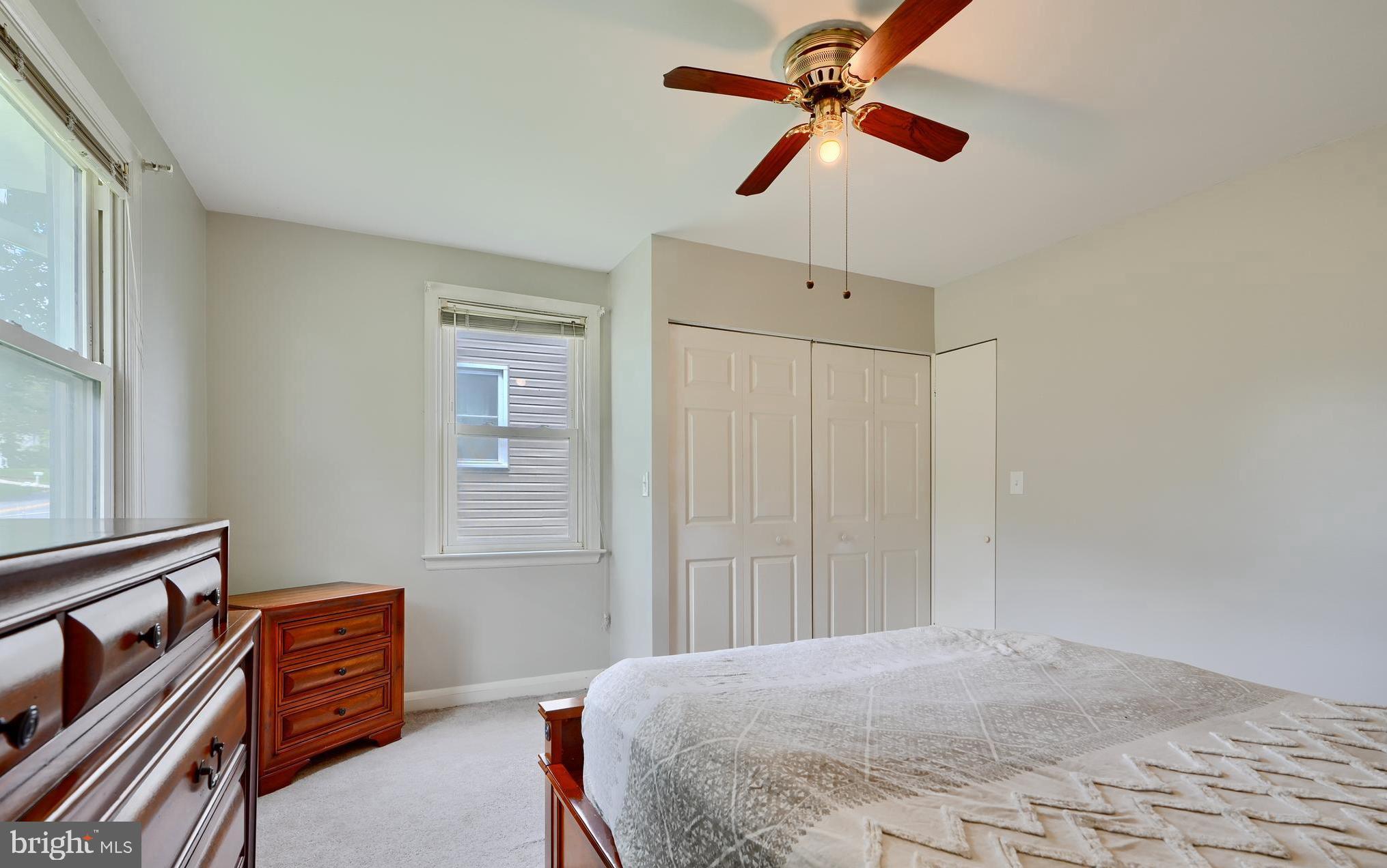 8203 Oakleigh Road Baltimore, MD 21234 - Photo 28 of 56 a bedroom with furniture and a window