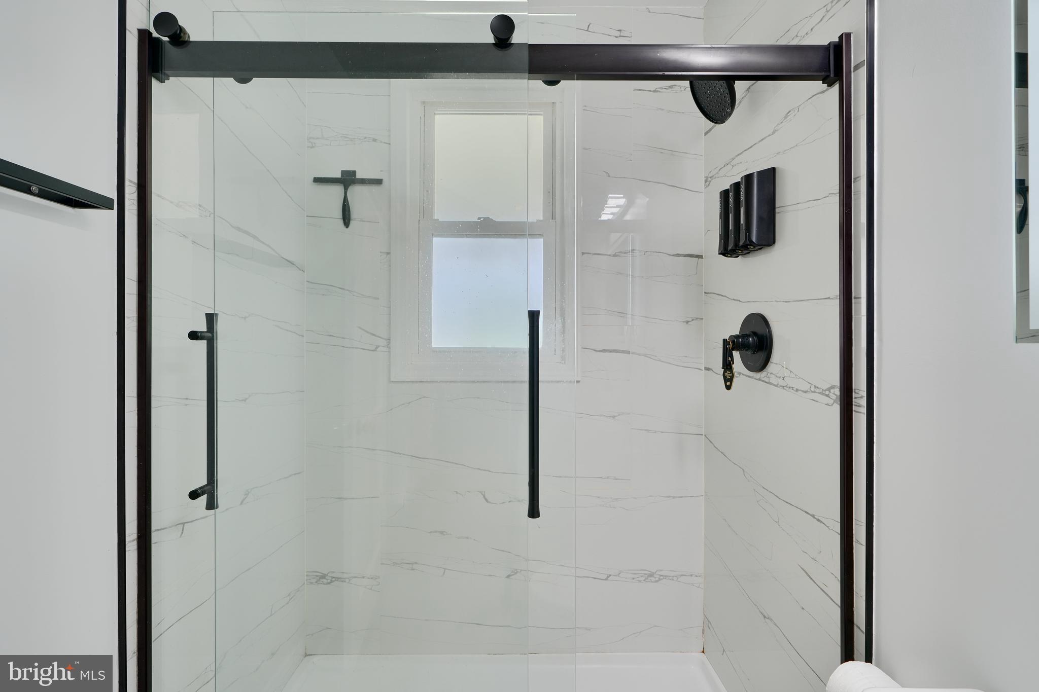 8203 Oakleigh Road Baltimore, MD 21234 - Photo 30 of 56 a bathroom with a shower