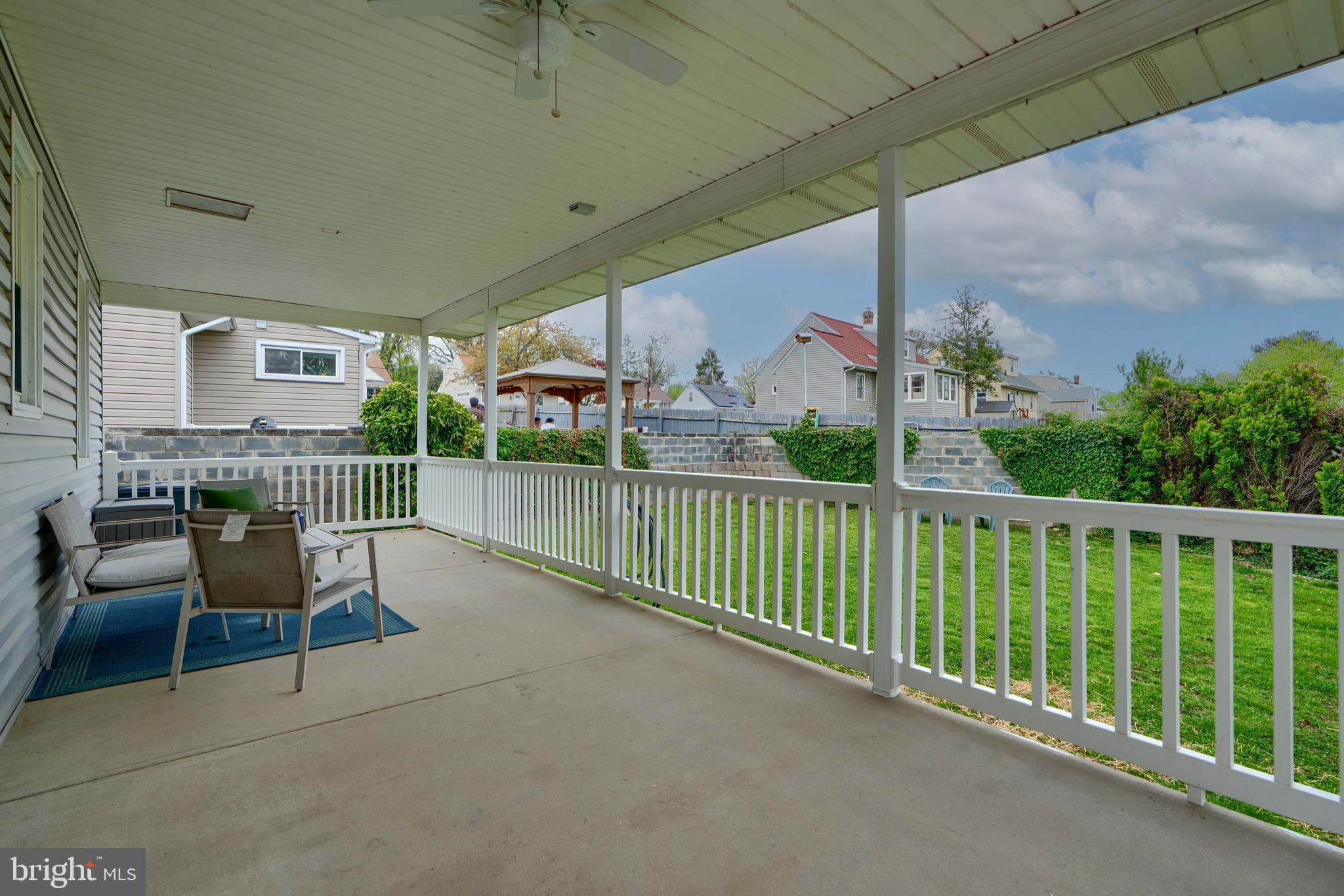 8203 Oakleigh Road Baltimore, MD 21234 - Photo 52 of 56 a view of a porch with furniture