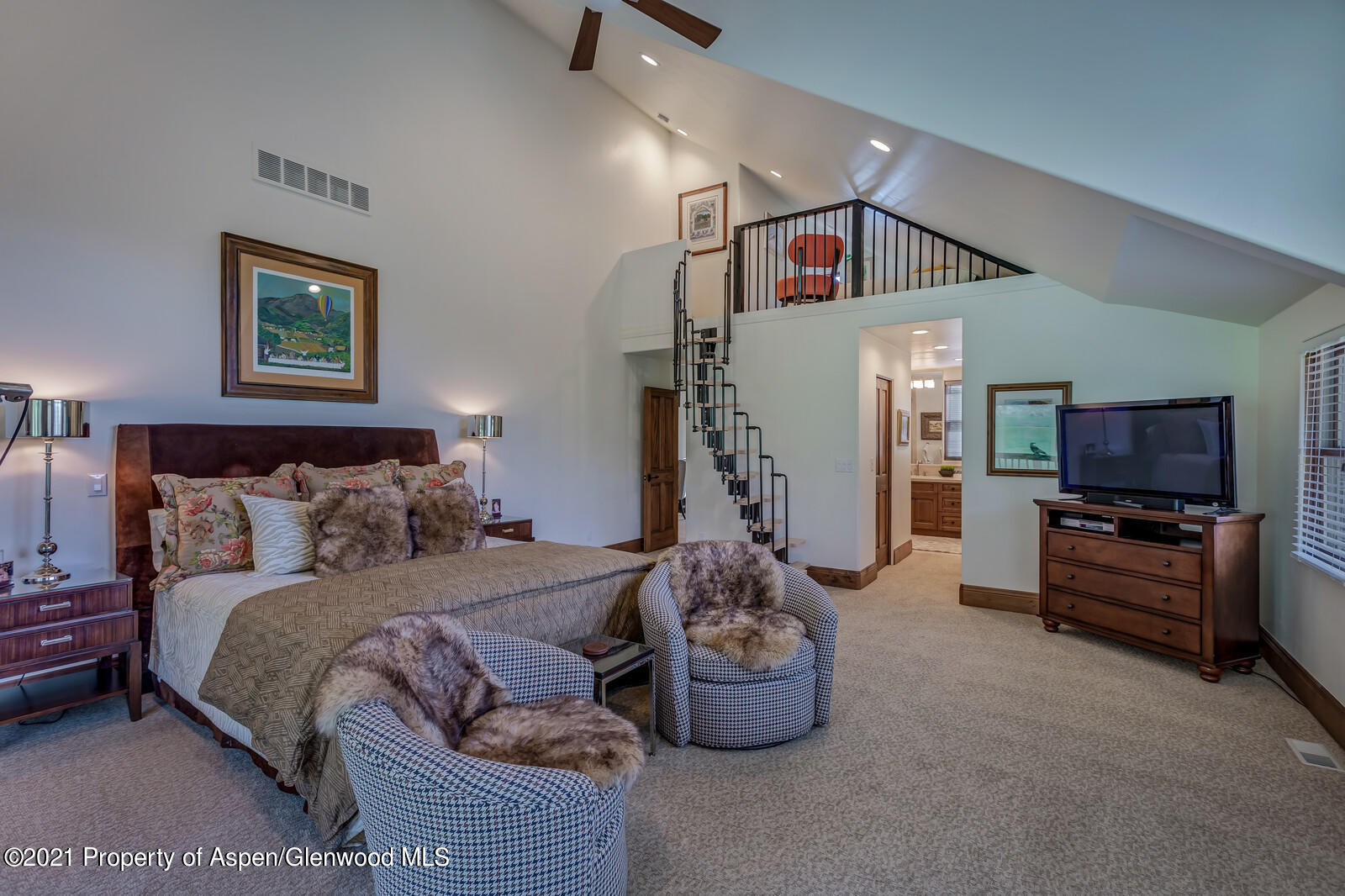 245 Saddleback Road Carbondale, CO 81623 - Photo 11 of 19 a bedroom with furniture and a flat screen tv