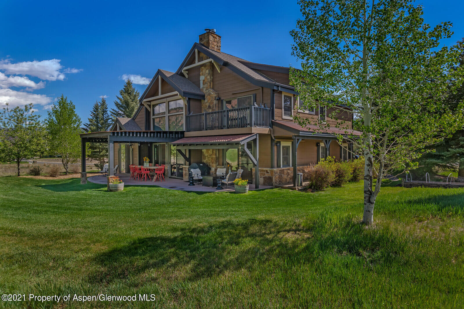 245 Saddleback Road Carbondale, CO 81623 - Photo 16 of 19 a front view of a house with a garden
