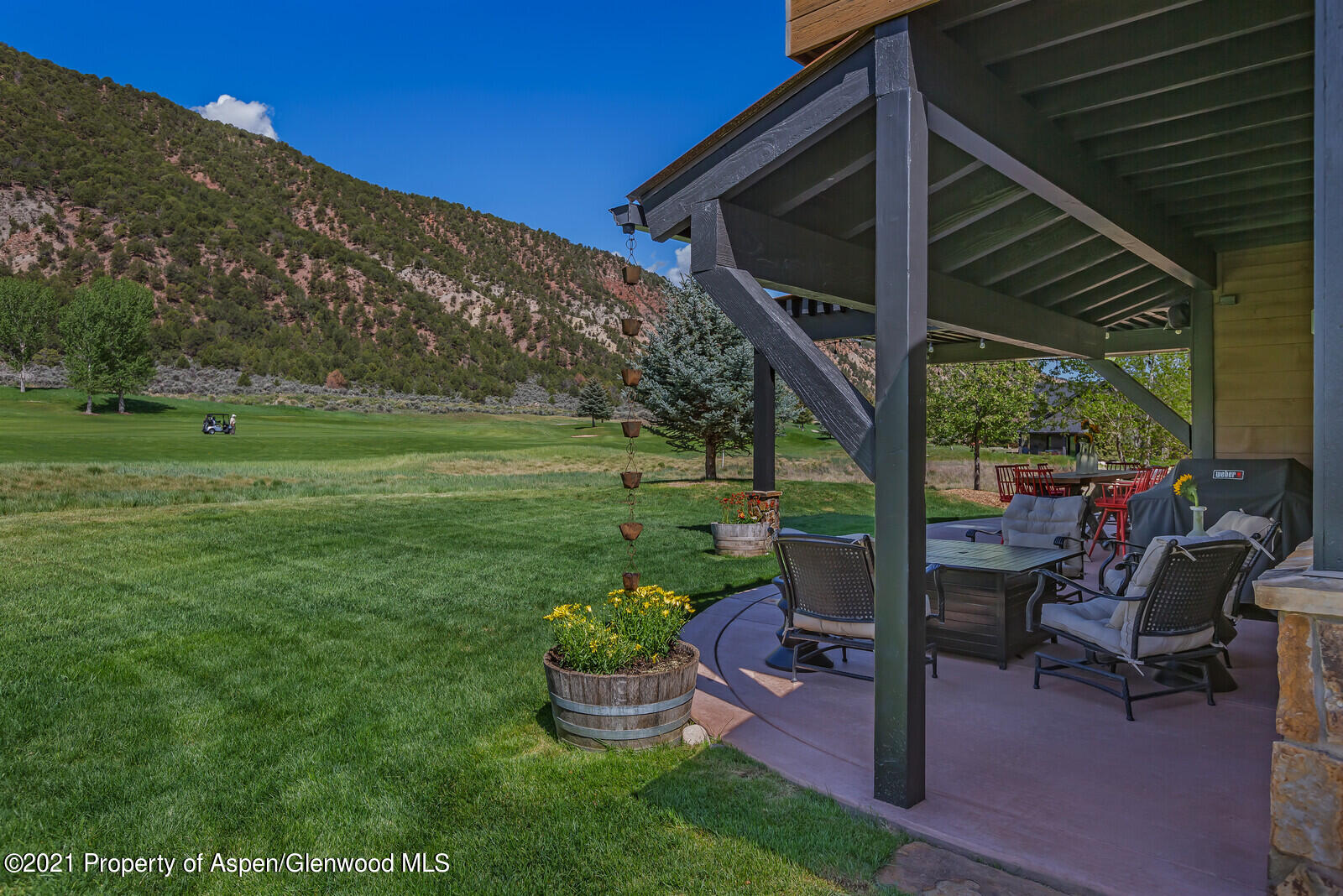 245 Saddleback Road Carbondale, CO 81623 - Photo 17 of 19 a view of a porch with furniture and a yard