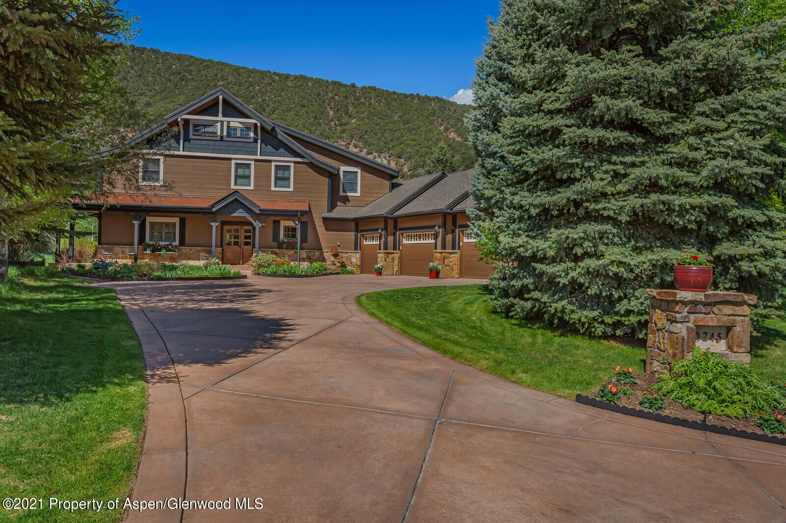 245 Saddleback Road Carbondale, CO 81623 - Photo 2 of 19 a front view of a house with a yard