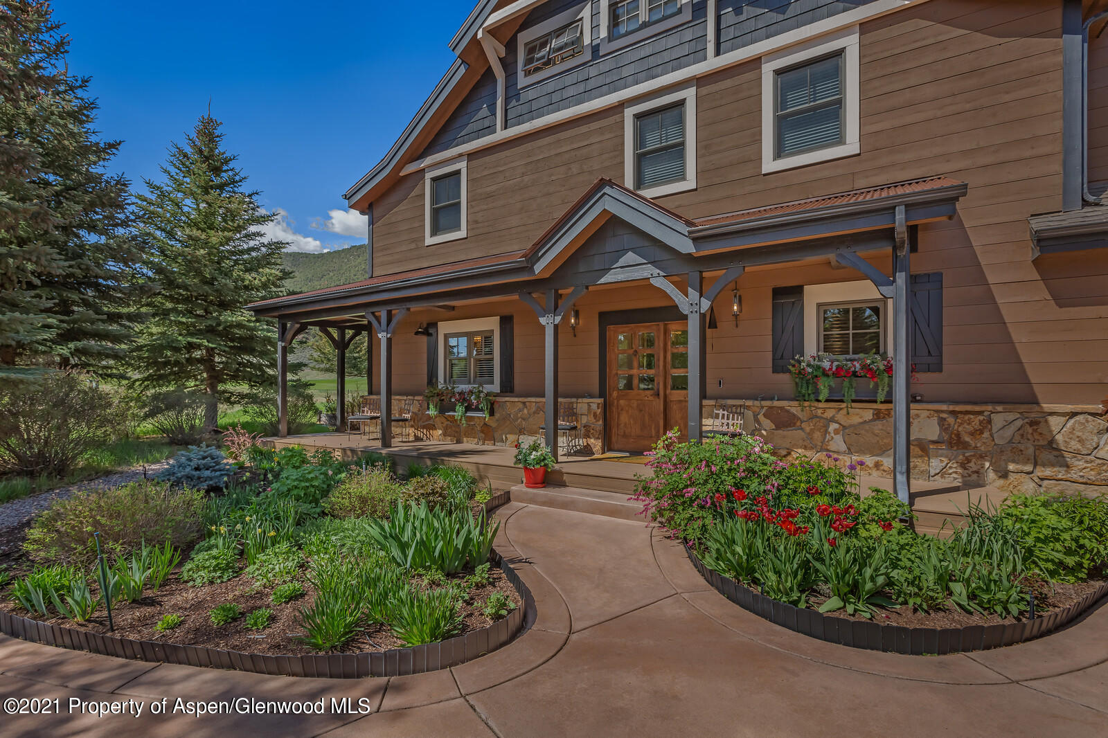 245 Saddleback Road Carbondale, CO 81623 - Photo 3 of 19 a front view of a house with garden