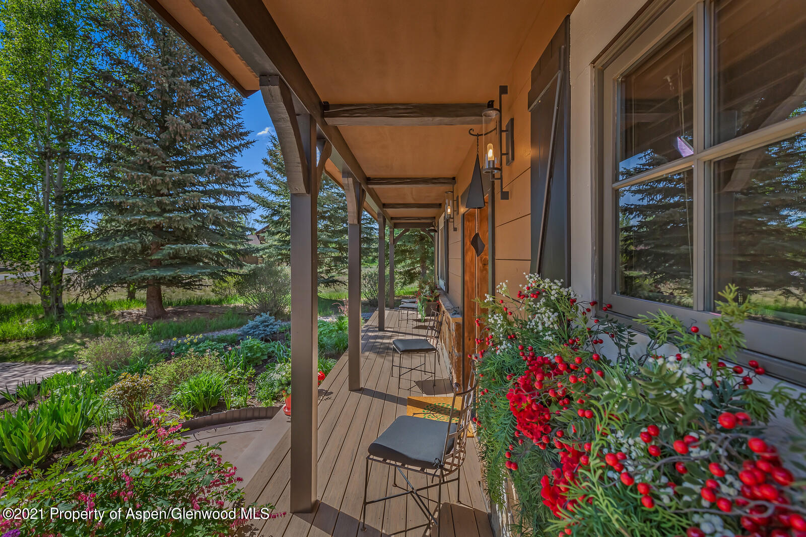 245 Saddleback Road Carbondale, CO 81623 - Photo 4 of 19 a view of a house with a porch and garden