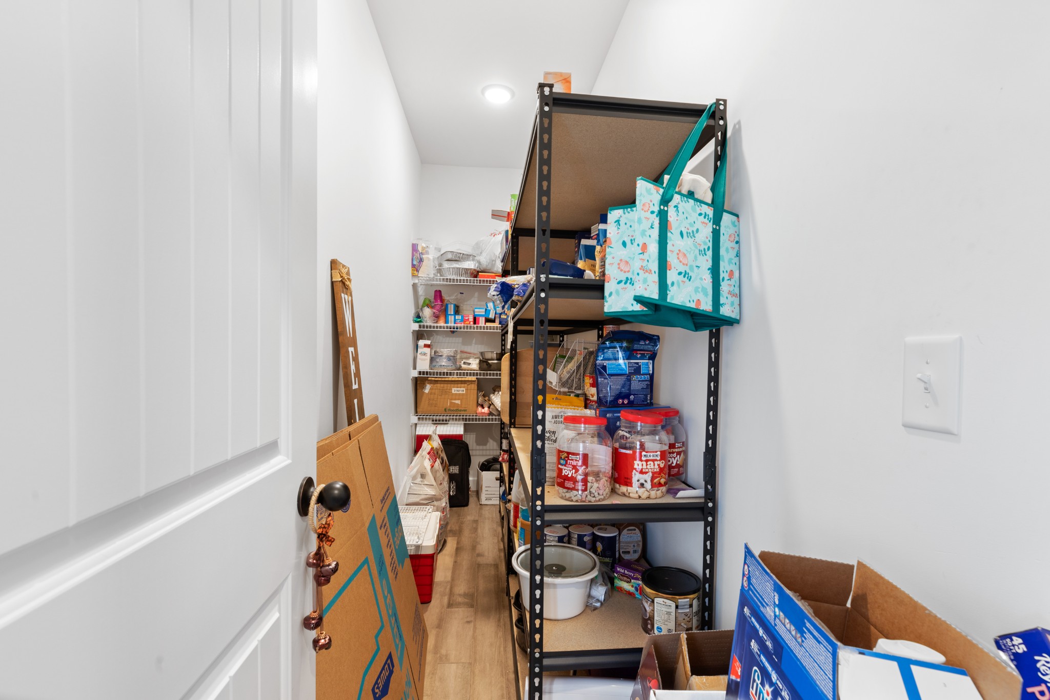3006 Westcot Road White Bluff, TN 37187 - Photo 18 of 25 Walk in pantry with build in shelves. (the dark gray ones will be taken with the seller ).
