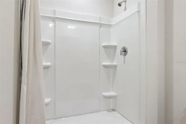 a bedroom with a bed and closet