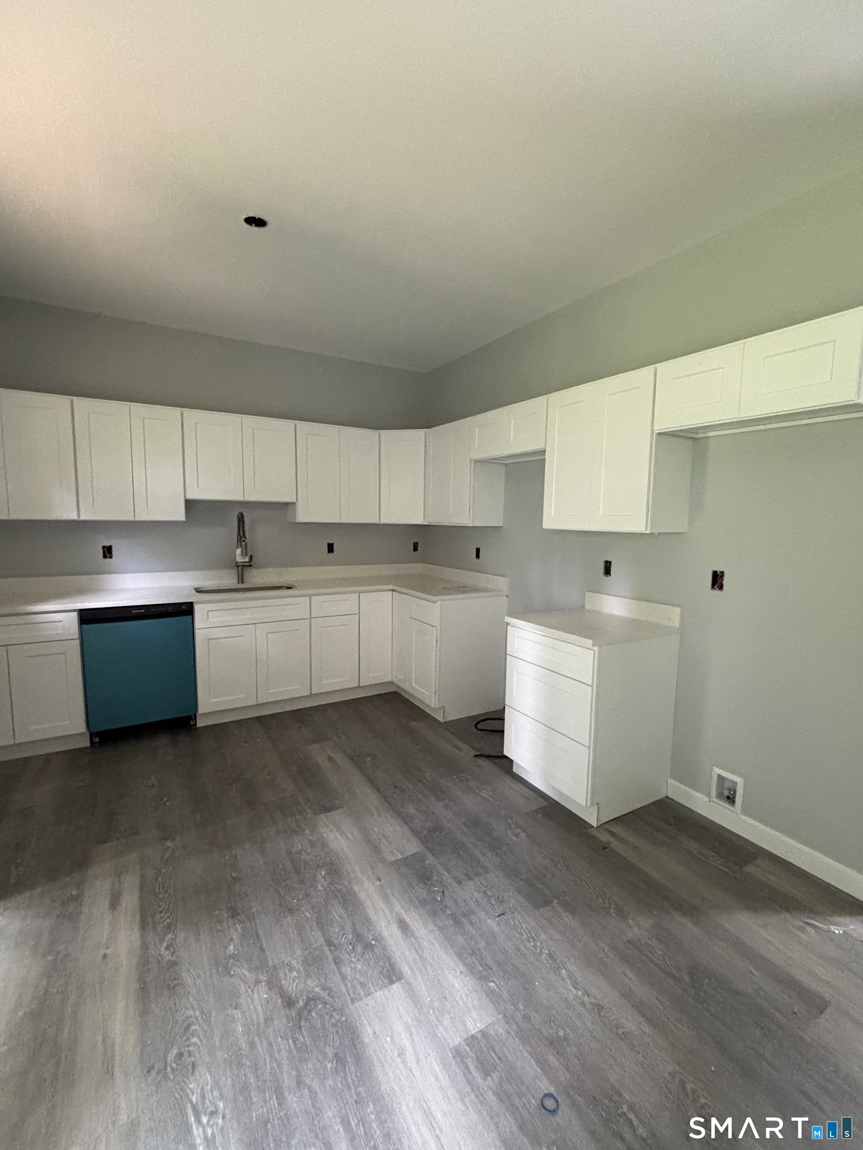 9 Putnam Park Road Bethel, CT 06801 - Photo 14 of 16 a kitchen with a cabinets and window