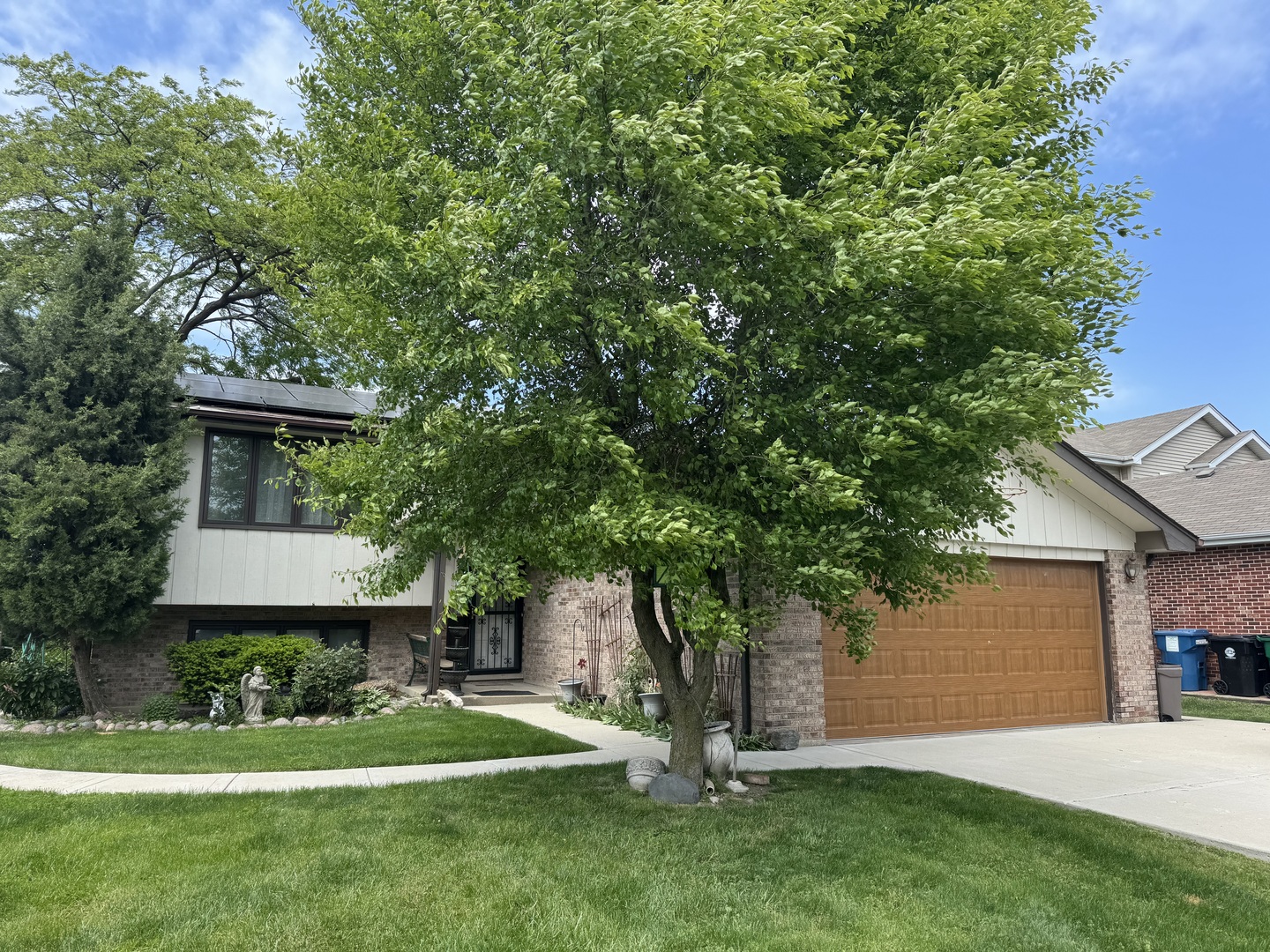 7432 Beloit Avenue Bridgeview, IL 60455 - Photo 1 of 1 a view of a house with a yard and tree s