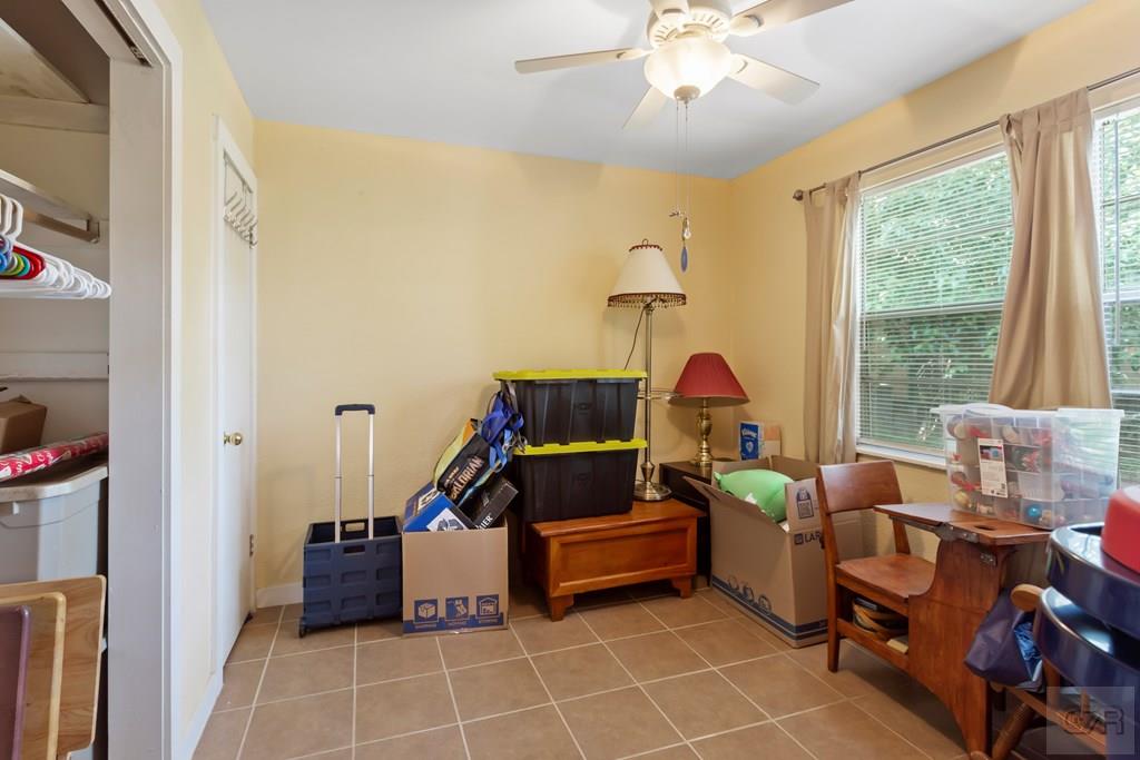 4444 18th Street Bacliff, TX 77518 - Photo 8 of 13 a living room with furniture and a window