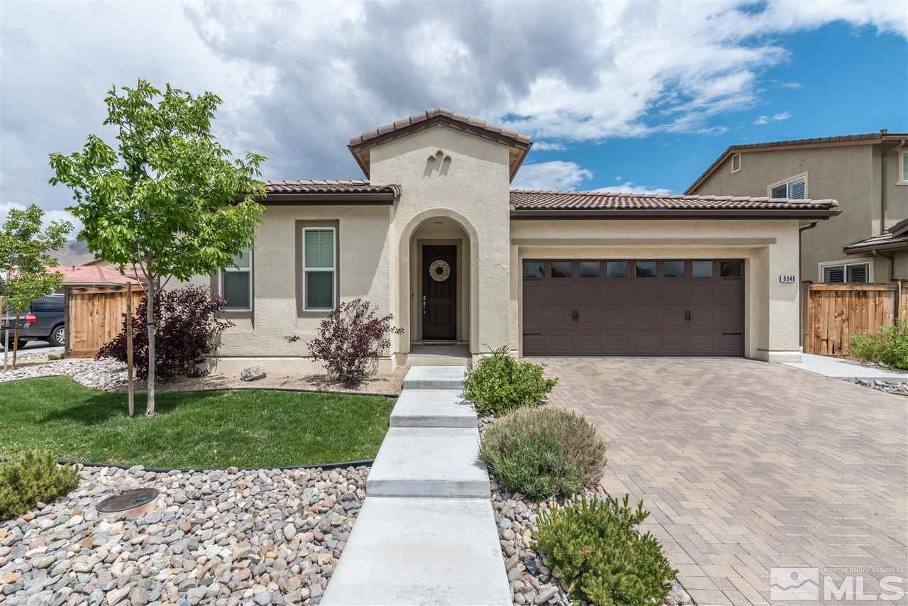 9340 Mill Iron Road Reno, NV 89521 - Photo 1 of 25 a view of a house with a garden