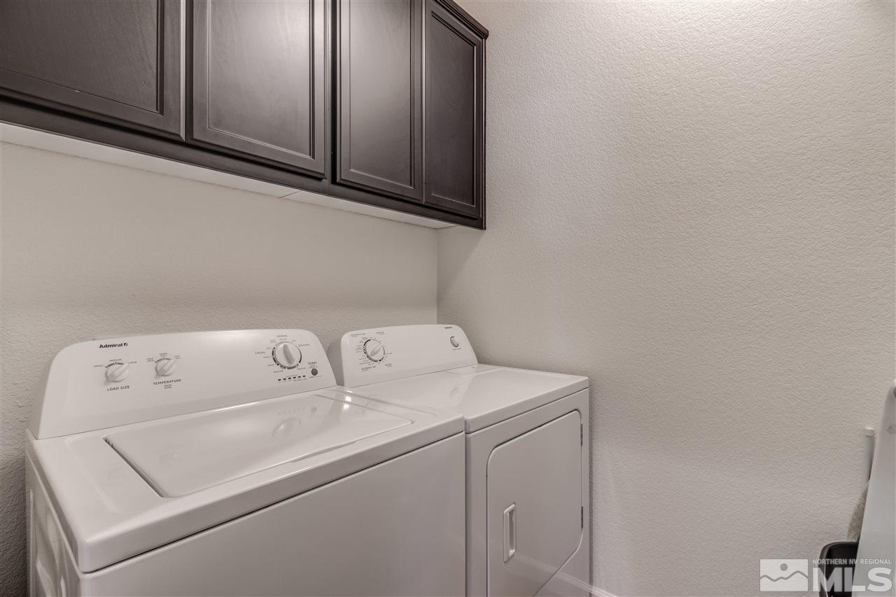 9340 Mill Iron Road Reno, NV 89521 - Photo 21 of 25 a utility room with dryer and washer