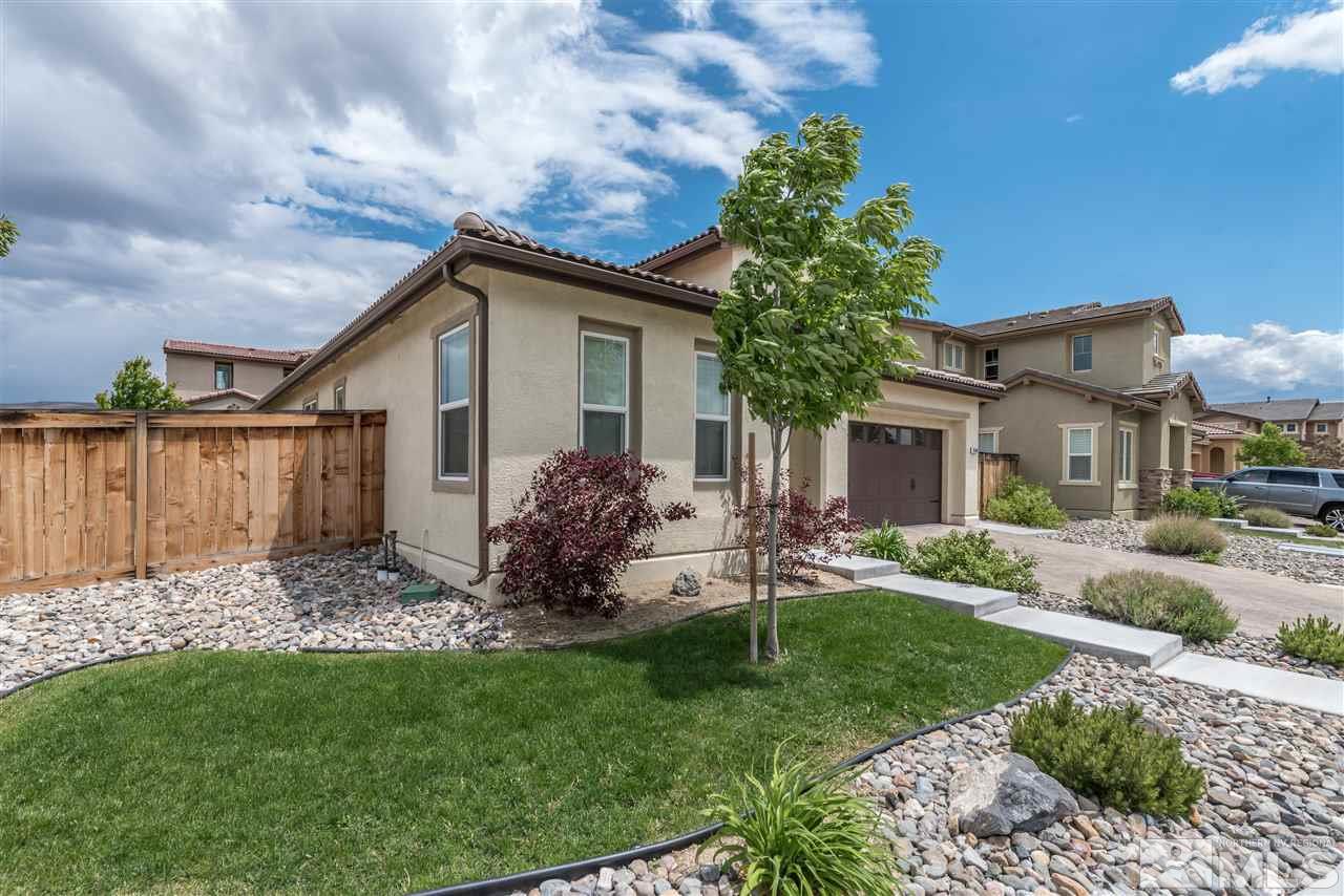 9340 Mill Iron Road Reno, NV 89521 - Photo 3 of 25 a view of a house with a yard and pathway