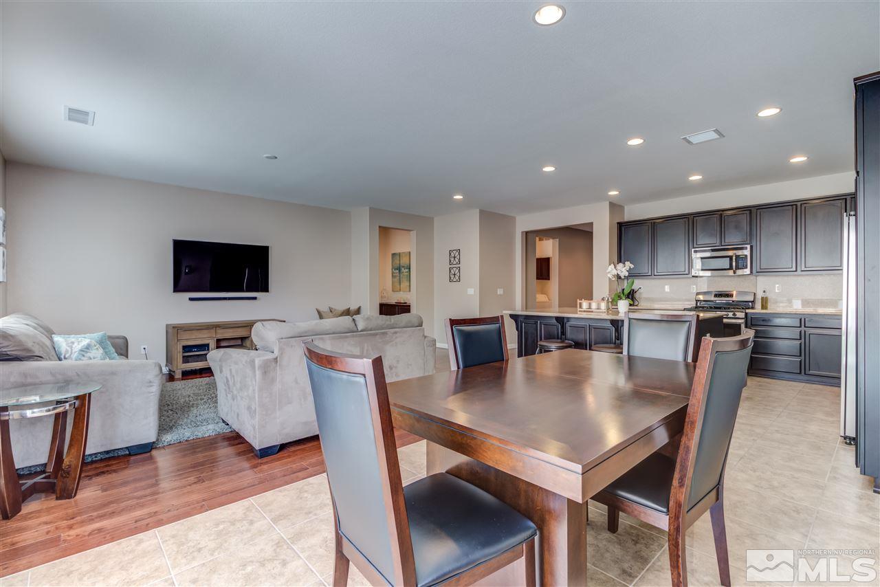 9340 Mill Iron Road Reno, NV 89521 - Photo 8 of 25 a view of kitchen with dining table and chairs