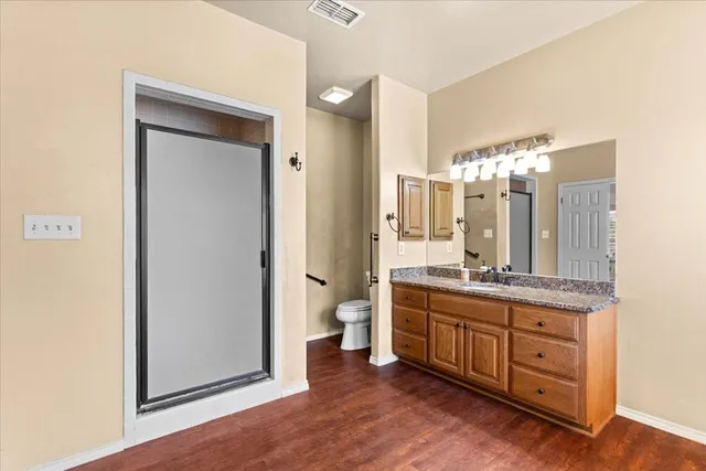 a view of a porch with wooden floor and outdoor space