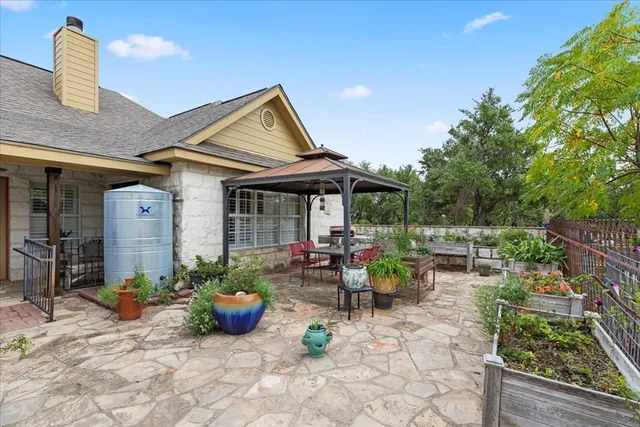 a bedroom with a large bed and a large window