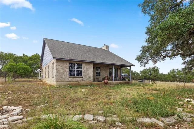 a bathroom with a sink vanity and a mirror