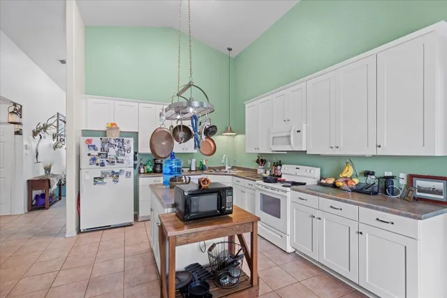 a view of a yard with a tree