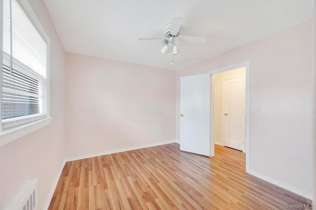 51 Stevenson Road Hewlett, NY 11557 - Photo 11 of 21 Spare room featuring light wood-style flooring and a ceiling fan