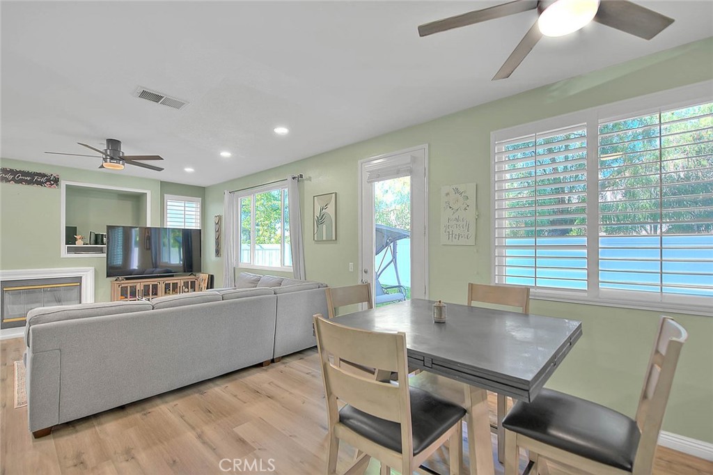 5602 Allendale Drive Riverside, CA 92507 - Photo 15 of 49 a living room with furniture and a flat screen tv