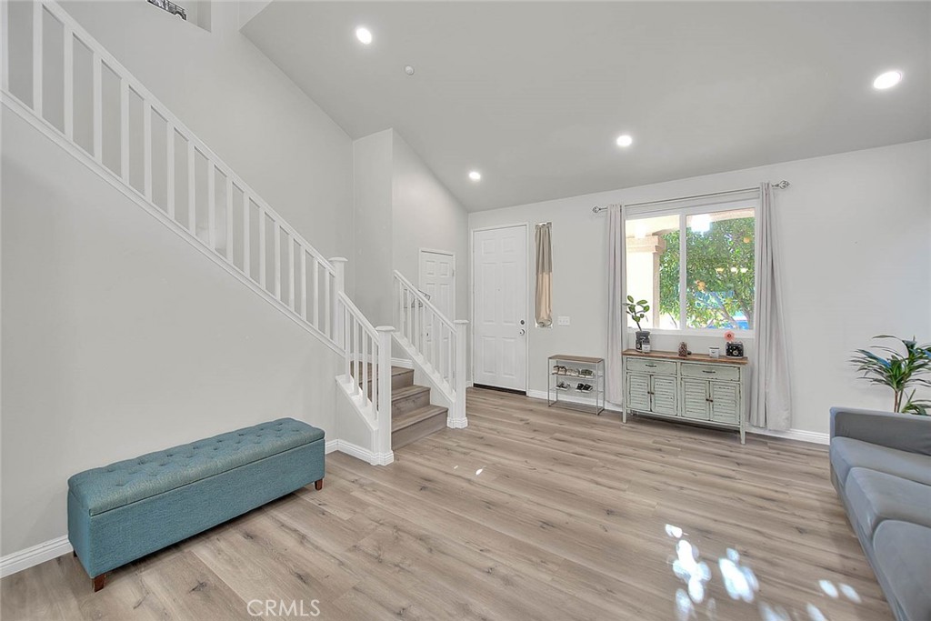 5602 Allendale Drive Riverside, CA 92507 - Photo 25 of 49 a living room with furniture and stairs