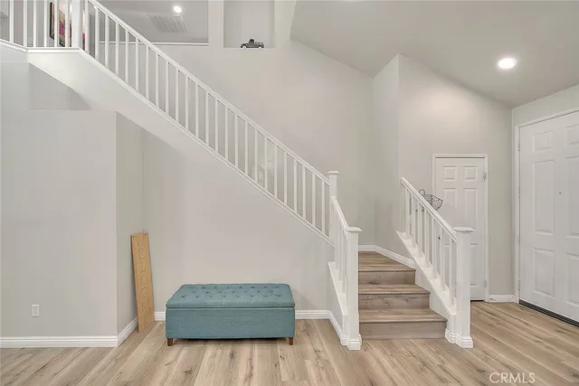a view of entryway with wooden floor