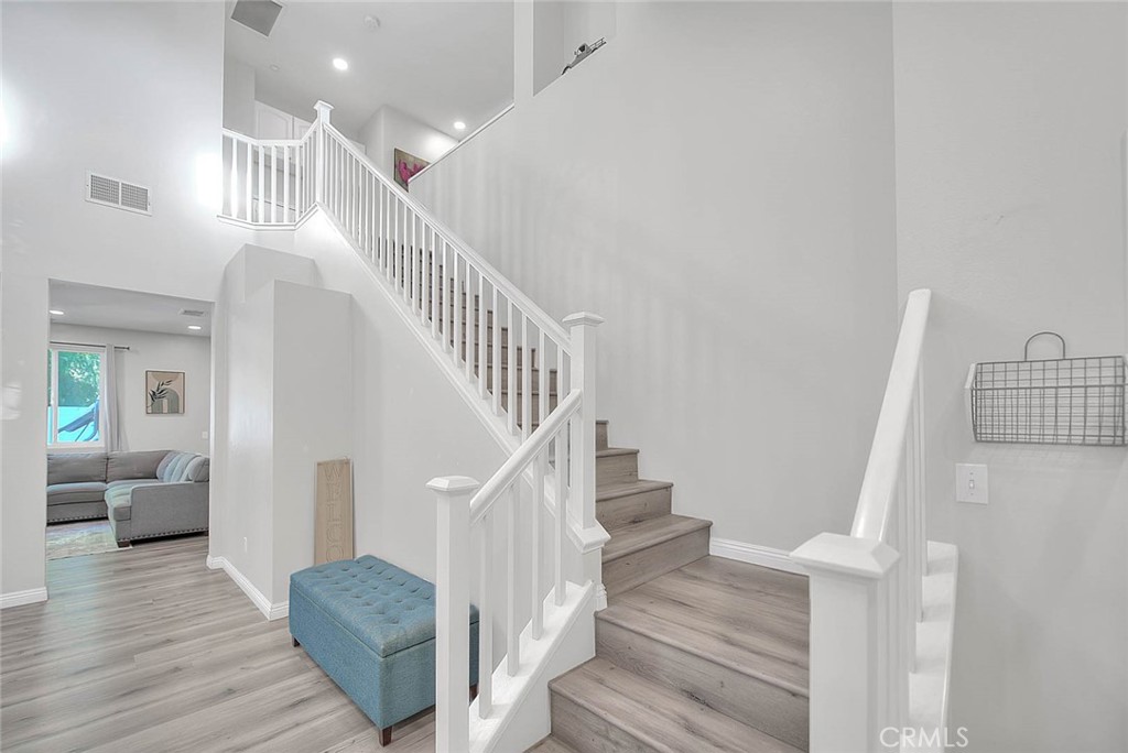 5602 Allendale Drive Riverside, CA 92507 - Photo 30 of 49 a view of entryway and hall with wooden floor