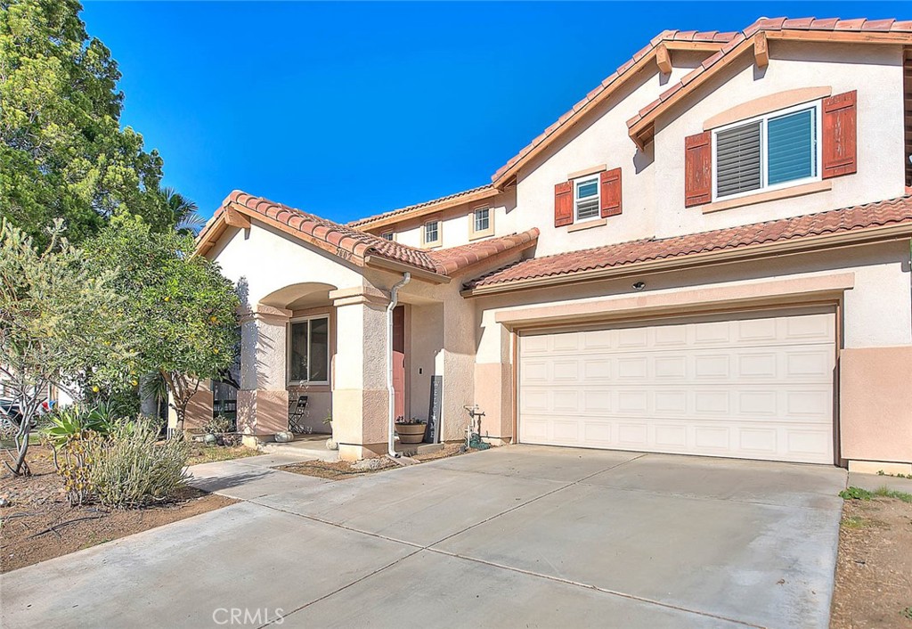 5602 Allendale Drive Riverside, CA 92507 - Photo 3 of 49 a view of a house with a outdoor space and garage