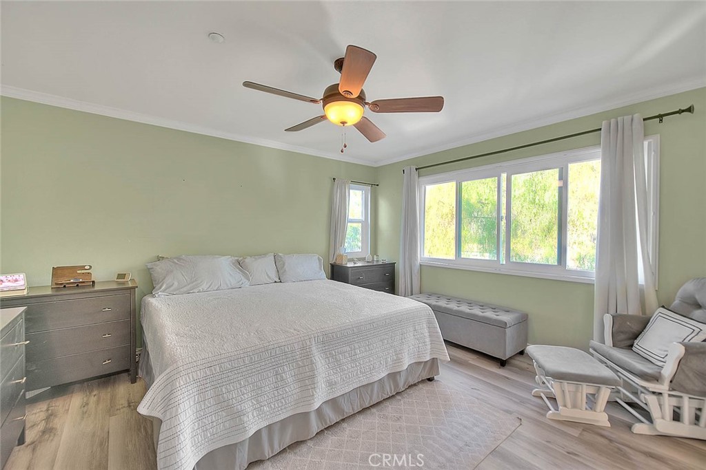 5602 Allendale Drive Riverside, CA 92507 - Photo 32 of 49 a bedroom with a bed furniture and a window