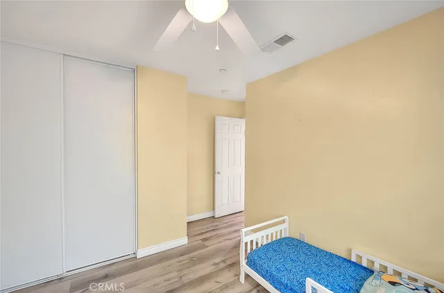 a view of room with wooden floor and chair