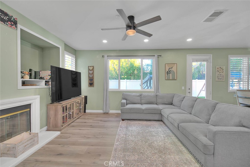 5602 Allendale Drive Riverside, CA 92507 - Photo 6 of 49 a living room with furniture and a flat screen tv